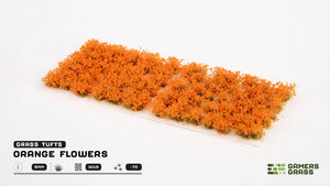 Spieler grasen orangefarbene Blumen